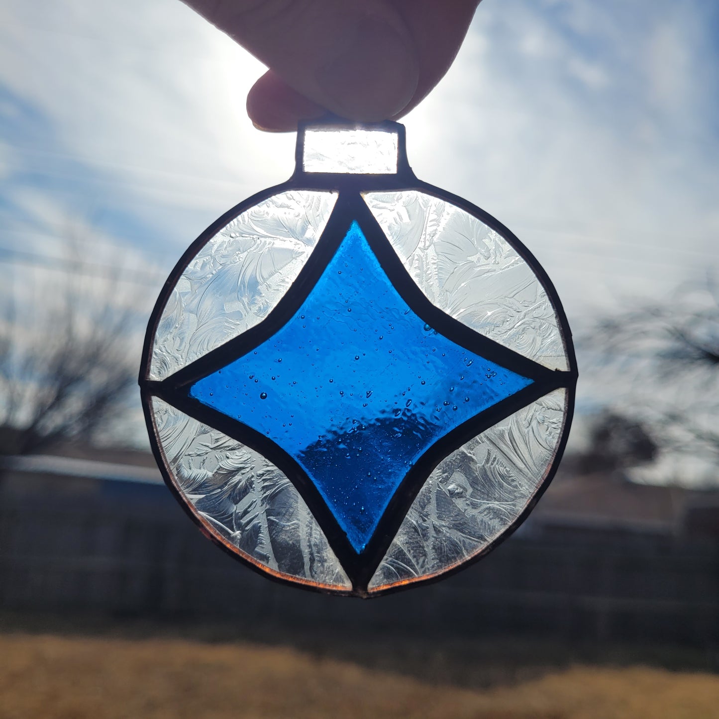 Round Star Ornament