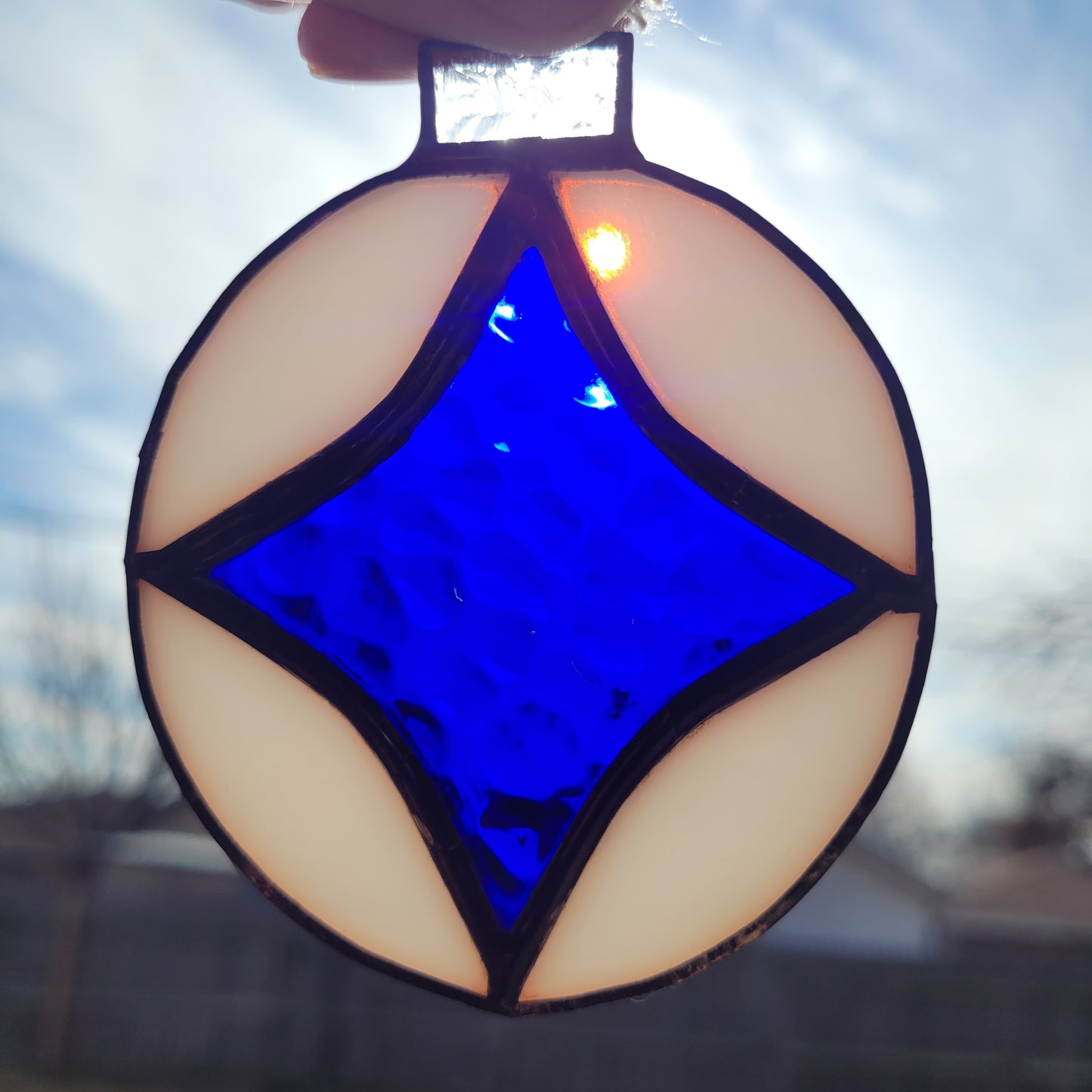 Round Star Ornament